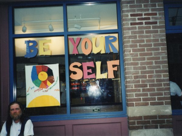 Exterior view of PARC window with "Be Yourself" written in brightly coloured letters.