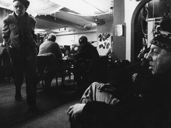 Group of PARC members sitting at tables in Drop-In