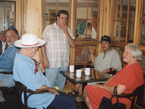 Older woman playing cards at PARC Drop-In