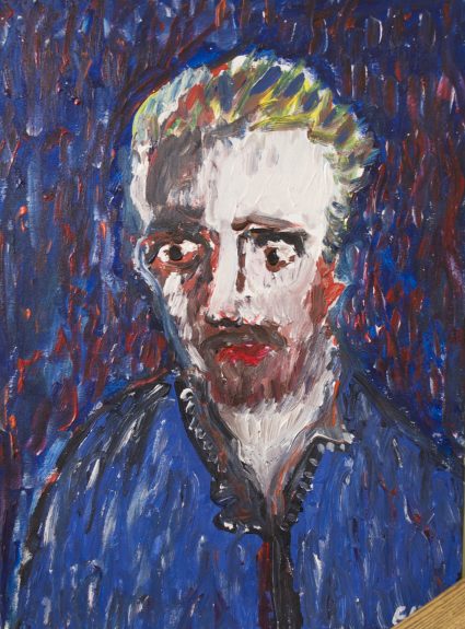 portrait d'un homme au chandail bleu