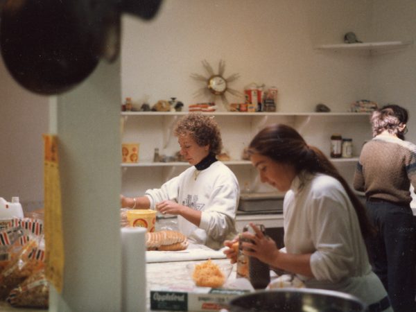 Photo of three women in the kitchen at PARC prepping food