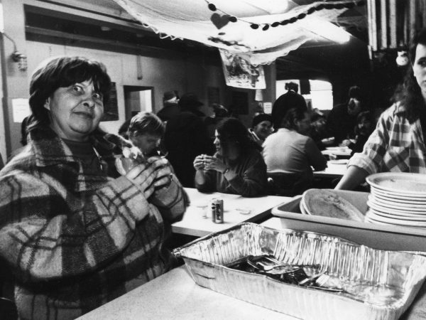 Photo of mealtime at PARC with comical figure of woman in the front